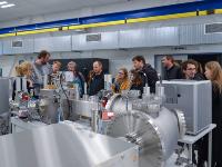 One of the Open Days excursions to the AMS laboratory  (far left: presenter Kateřina Pachnerová Brabcová)