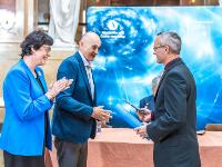 E. Zažímalová and P. Baran congratulate V. Jakubský