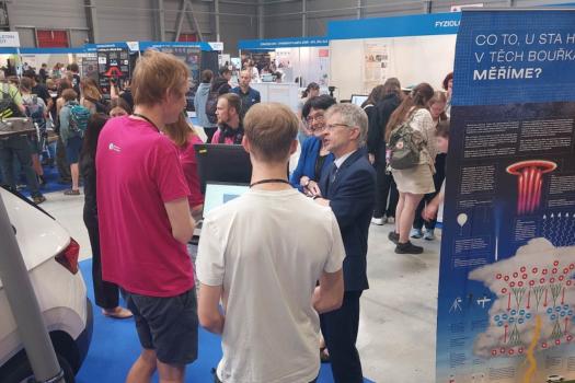 Prof. Eva Zažímalová and Mr. Miloš Vystrčil (on the right) visiting the NPI exhibition at the Science Fair